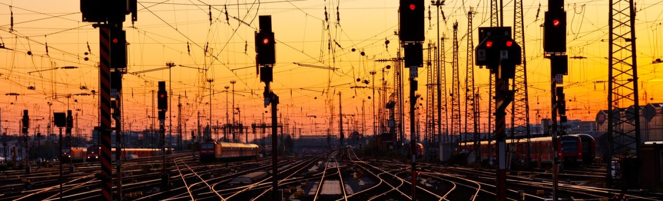 Railway,Tracks,At,A,Major,Train,Station,At,Sunset.