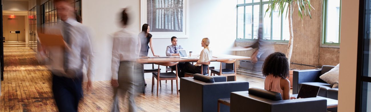 Business,People,At,Work,In,A,Busy,Luxury,Office,Space