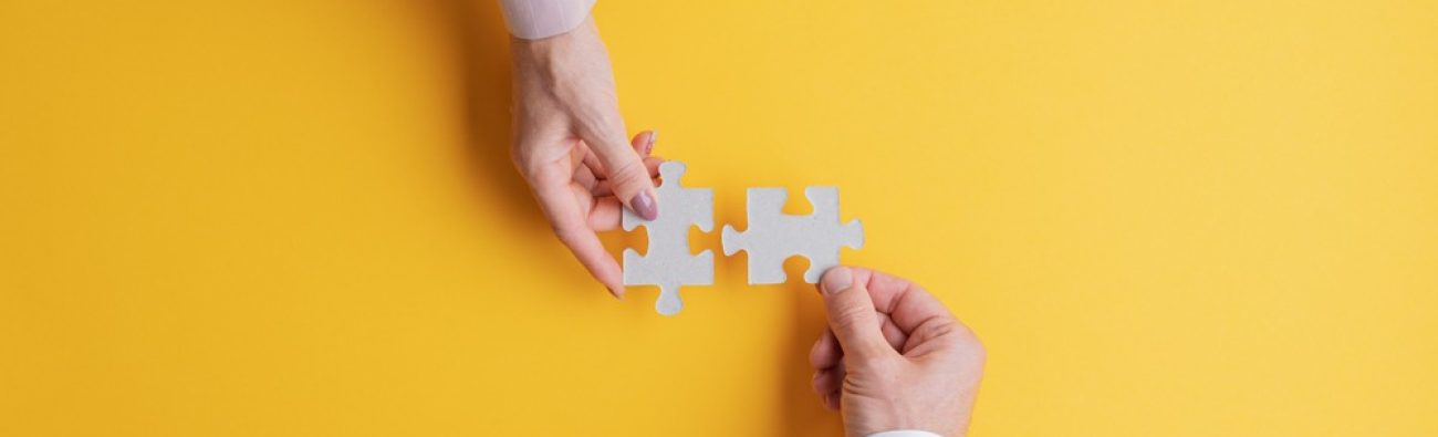 Top,View,Of,Male,And,Female,Hands,Joining,Two,Matching