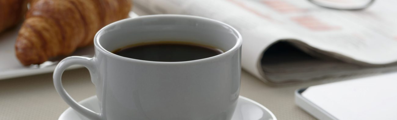 Coffee and french croissants for breakfast at the hotel during the morning press.